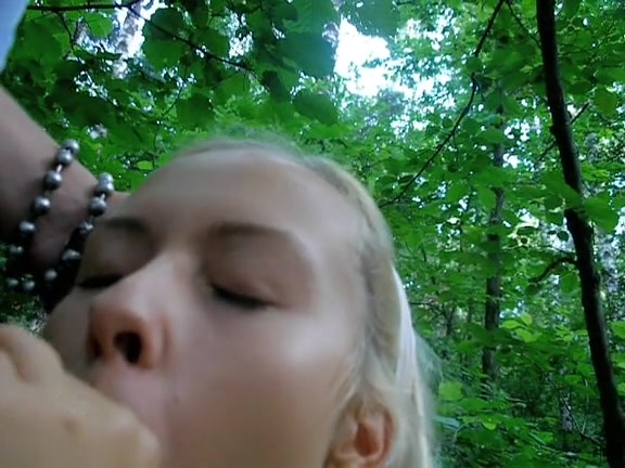 Doing a blowjob in the forest