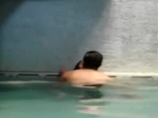 Newly Wed Couple In Pool