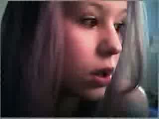 Pretty teen strips in a webcam porno vid