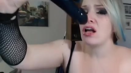 Emo blonde having fun with homemade blowjob toy