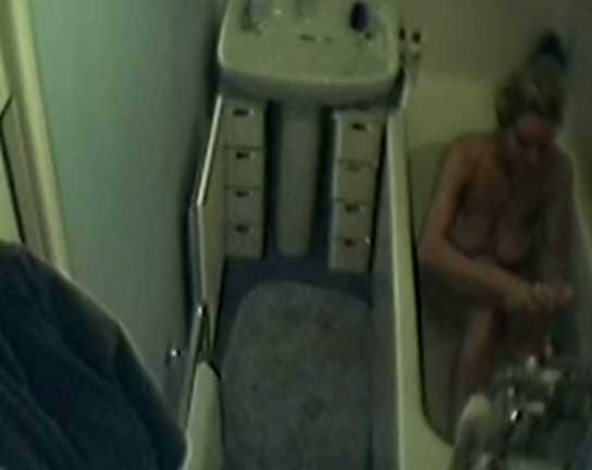 Curvy blonde wife bathing