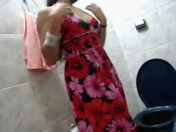 Hot Latina Strips in the Bathroom