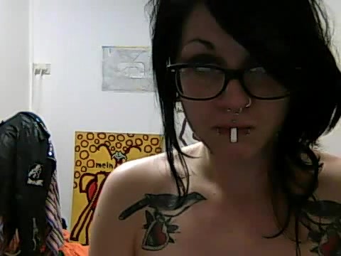 Pierced and tattooed babe on webcam