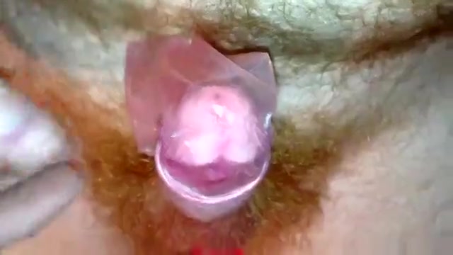 Hairy Redhead Using Condom Cum as Lube