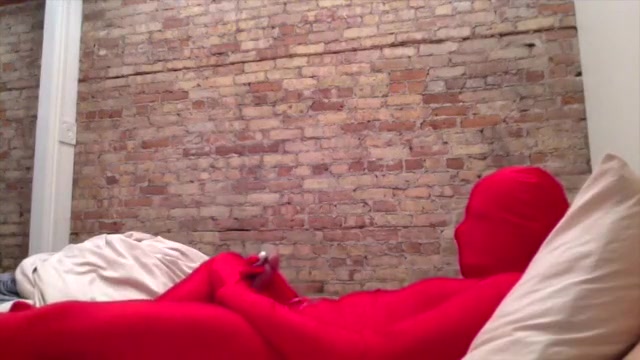 Zentai play in red with vibrator