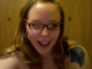Nerdy girl dildoing on webcam