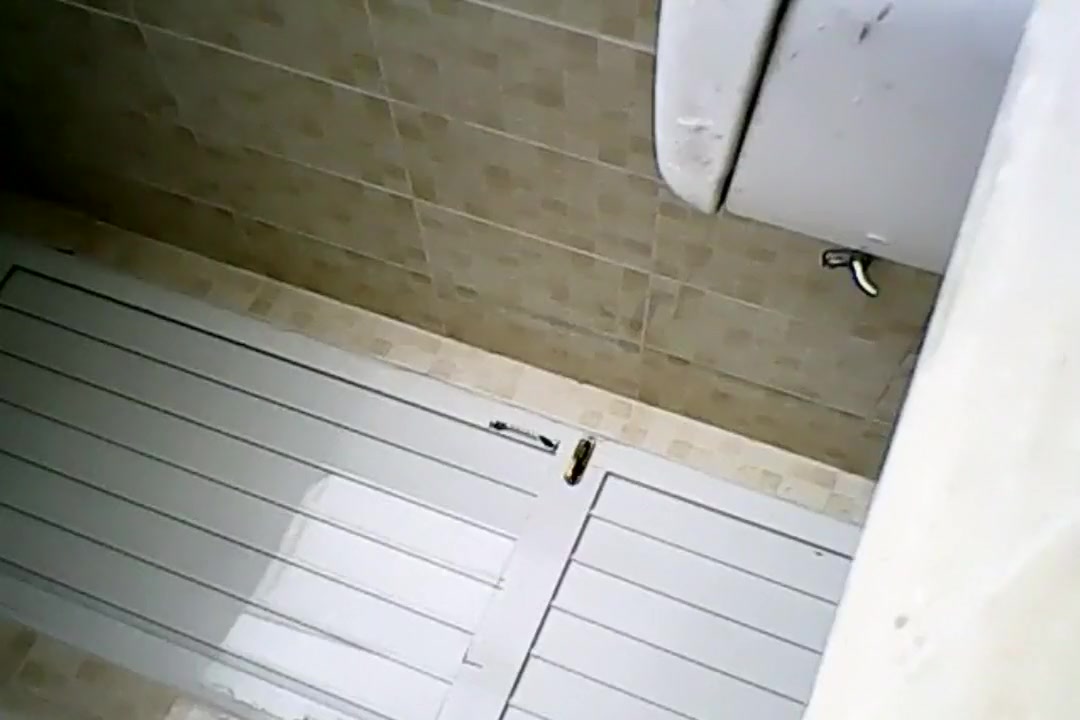 skinny girl taking pee in the bathroom