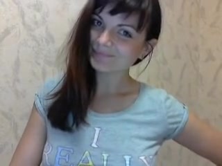 Dark haired teen teases on a webcam